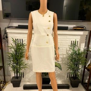 Elegant Beautiful white dress with gold design.